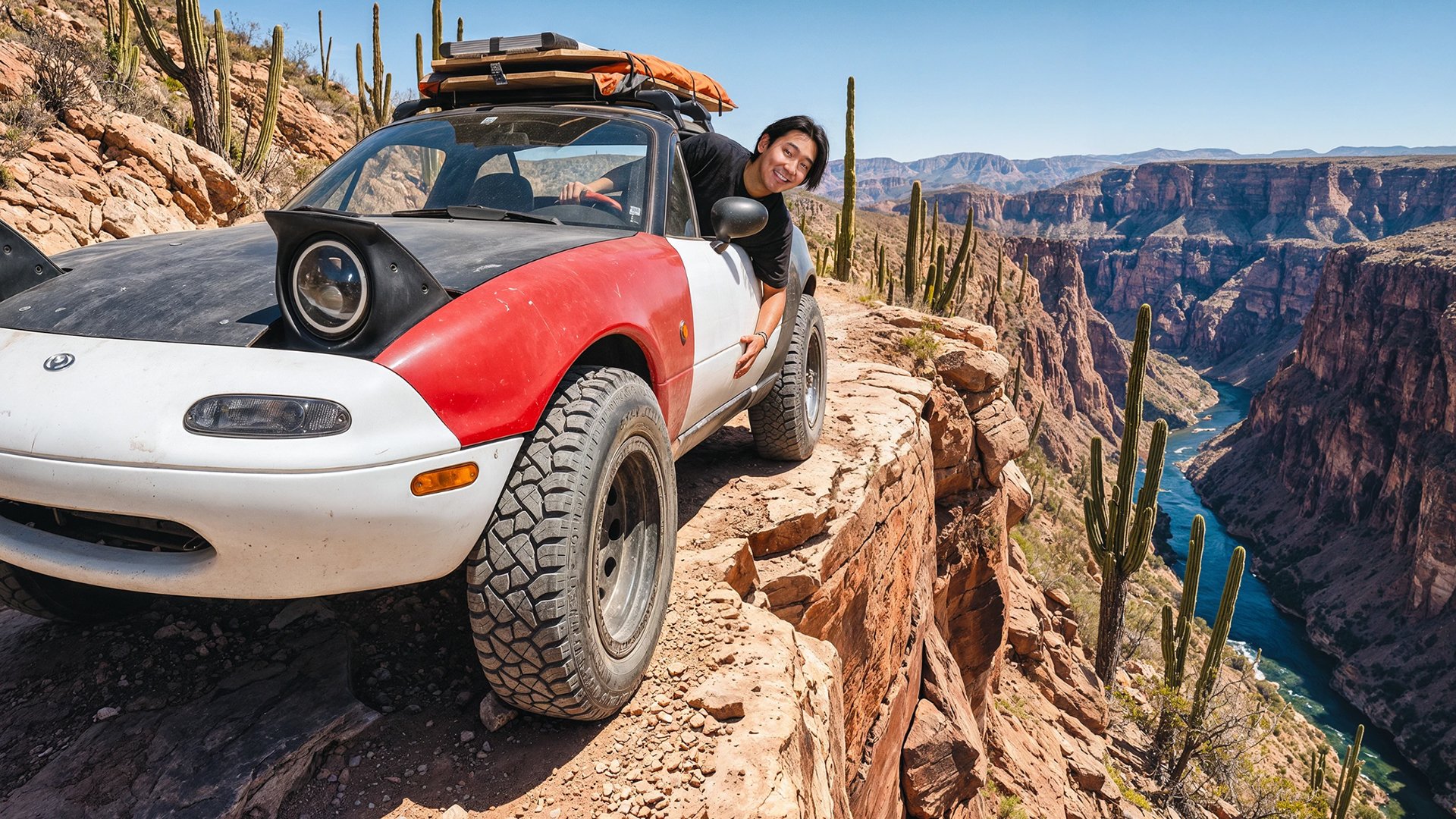Off-road car on a canyon cliff edge