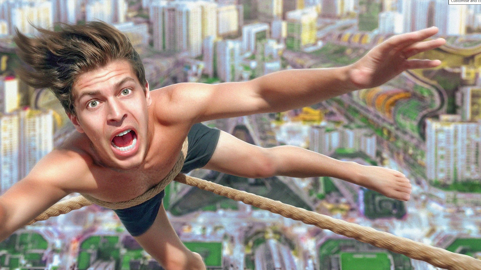 Man on a highline above a city